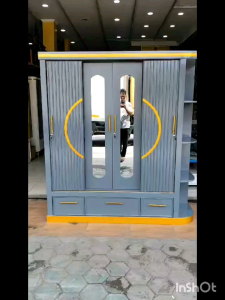 Lemari Pakaian 4 Pintu Rak Samping Bahan Multiplek/Trinityjayafurniture
