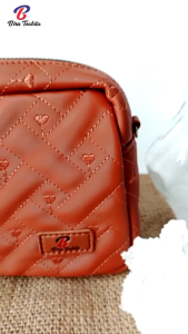 TAS SELEMPANG YASMINE by BIRU TSABITA TALI RANTAI\\n\\n Apa Itu Tas Selempang Wanita?\\n\\nTas selempang wanita merupakan aksesori fashion yang menjadi pilihan populer bagi banyak wanita di seluruh dunia. Dengan berbagai desain dan gaya, tas selempang memberikan penampilan yang modis dan praktis bagi pemakainya. Salah satu tas selempang wanita yang patut diperhitungkan adalah Tas Selempang Yasmine by Biru Tsabita Tali Rantai.\\n\\n Mengenal Desain Elegan Tas Selempang Yasmine\\n\\nTas Selempang Yasmine menawarkan desain elegan yang cocok untuk berbagai acara dan kesempatan. Tas ini memiliki gaya yang modern dan chic, membuatnya menjadi pilihan ideal untuk penampilan sehari-hari maupun acara formal. Desainnya yang unik dan menarik menjadikan Tas Selempang Yasmine sebagai aksesori fashion yang wajib dimiliki oleh setiap wanita.\\n\\n Mengenal Kualitas Tinggi Tas Selempang Biru Tsabita\\n\\nTas Selempang Yasmine by Biru Tsabita Tali Rantai terbuat dari bahan berkualitas tinggi yang dirancang untuk tahan lama dan awet. Bahan yang digunakan sangat kuat dan tahan terhadap goresan, membuat tas ini menjadi investasi yang baik untuk koleksi aksesori fashion Anda. Selain itu, tas ini dilengkapi dengan resleting yang kuat dan tahan lama, menjadikan Tas Selempang Yasmine sebagai pilihan yang ideal bagi Anda yang mencari tas selempang berkualitas tinggi.\\n\\n Bagaimana Cara Memilih Tas Selempang Yasmine?\\n\\nMemilih Tas Selempang Yasmine yang tepat bisa menjadi tantangan bagi banyak orang. Namun, dengan tips berikut ini, Anda bisa menemukan tas selempang yang sempurna untuk Anda.\\n\\n Tips Memilih Tas Selempang Desain Elegan\\n\\nJika Anda mencari Tas Selempang Yasmine dengan desain elegan, pastikan untuk memperhatikan detail seperti bentuk tas, warna, dan aksen tambahan. Pilihlah tas yang memiliki desain yang sesuai dengan gaya dan kepribadian Anda. Jangan lupa untuk mempertimbangkan bagaimana tas tersebut akan dipadukan dengan pakaian Anda.\\n\\n Tips Memilih Tas Selempang Kualitas Tinggi\\n\\nJika Anda mencari Tas Selempang Yasmine dengan kualitas tinggi, pastikan untuk memeriksa bahan dan konstruksi tas. Pilihlah tas yang terbuat dari bahan berkualitas tinggi dan dirancang dengan baik. Selain itu, pastikan tas tersebut dilengkapi dengan resleting yang kuat dan tahan lama.\\n\\n Bagaimana Cara Merawat Tas Selempang Yasmine?\\n\\nUntuk menjaga Tas Selempang Yasmine agar tetap awet dan tampil cantik, penting untuk merawatnya dengan baik. Berikut ini beberapa tips merawat Tas Selempang Yasmine:\\n\\n Tips Merawat Tas Selempang Dengan Resleting\\n\\nUntuk merawat Tas Selempang Yasmine dengan resleting, pastikan untuk membersihkan resleting secara rutin menggunakan kain lembut dan deterjen ringan. Jangan lupa untuk menghindari penggunaan alkohol atau bahan kimia lainnya yang dapat merusak resleting.\\n\\n Tips Merawat Tali Rantai Tas Biru\\n\\nUntuk merawat tali rantai Tas Selempang Yasmine by Biru Tsabita Tali Rantai, pastikan untuk membersihkan tali secara rutin menggunakan kain lembut dan deterjen ringan. Jangan lupa untuk menghindari penggunaan alkohol atau bahan kimia lainnya yang dapat merusak tali rantai.\n}