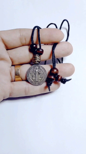 St. Benedict Antique Peso Size Medal For Protection Against Evil\\n\\n What is the St. Benedict Antique Peso Size Medal?\\n\\nThe St. Benedict Antique Peso Size Medal is a religious medal dedicated to Saint Benedict, one of the most revered saints in Christianity. This antique peso size medal serves as a symbol of faith and protection against evil, making it a popular choice among believers seeking spiritual defense.\\n\\n Historical Background of St. Benedict Medals\\n\\nSaint Benedict was born in the late 5th century in Nursia, Italy. He is widely known for founding the Benedictine Order, which established a set of guidelines for monastic life. These guidelines, known as the Rule of Saint Benedict, have greatly influenced Western monasticism and continue to inspire believers today.\\n\\nThe tradition of wearing Saint Benedict medals dates back to the Middle Ages. These medals were initially created to provide protection against evil spirits and to strengthen the wearer's faith. Over time, they have evolved into various sizes and designs, including the antique peso size medal.\\n\\n Understanding the Symbolism of the Antique Peso Size\\n\\nThe antique peso size St. Benedict Medal features several symbols that hold deep spiritual significance. On one side, there is an image of Saint Benedict holding a cross and a book, representing his devotion to Christ and his contributions to monastic life. On the other side, the medal displays the letters \"C S S M L\" and \"N D S M D,\" which stand for \"Crux Sacra Sit Mihi Lux\" and \"Non Draco Sit Mihi Dux,\" respectively. These phrases translate to \\\"May the holy cross be my light\\\" and \\\"Let not the dragon be my guide,\\\" emphasizing the wearer's commitment to faith and protection against evil.\\n\\n How to Use the St. Benedict Antique Peso Size Medal for Spiritual Defense\\n\\nTo fully embrace the power of the St. Benedict Antique Peso Size Medal, it is essential to understand how to incorporate it into daily life and spiritual practices.\\n\\n Practical Steps for Wearing the Medal\\n\\nWearing the medal can be done in several ways. Many believers choose to wear it as a necklace, allowing them to carry the symbol of faith close to their hearts throughout the day. Others may opt to place the medal in their homes or workplaces, believing that it will provide protection against evil influences.\\n\\n Incorporating the Medal into Daily Prayer and Rituals\\n\\nTo enhance the spiritual benefits of the St. Benedict Antique Peso Size Medal, believers can incorporate it into their daily prayer and ritual practices. For example, they may hold the medal during prayer, asking for guidance and protection from Saint Benedict. Additionally, they can place the medal near their prayer space or altar, serving as a constant reminder of their faith and commitment to spiritual defense.\\n\\n Benefits of Using the St. Benedict Antique Peso Size Medal\\n\\nThe St. Benedict Antique Peso Size Medal offers numerous benefits for those seeking spiritual defense and protection against evil.\\n\\n Enhancing Protection Against Evil\\n\\nBy wearing or placing the St. Benedict Antique Peso Size Medal, believers can feel a sense of security and protection against negative influences. This powerful symbol serves as a shield, warding off evil spirits and promoting a peaceful environment.\\n\\n Strengthening Faith and Connection to God\\n\\nIncorporating the St. Benedict Antique Peso Size Medal into daily life can help strengthen one's faith and connection to God. The symbols and phrases on the medal serve as a constant reminder of the wearer's devotion to Christ and their commitment to living a virtuous life.\\n\\n Where to Purchase Authentic St. Benedict Antique Peso Size Medals\\n\\nFor those interested in purchasing an authentic St. Benedict Antique Peso Size Medal, it is essential to choose reputable retailers and online marketplaces.\\n\\n Trusted Retailers and Online Marketplaces\\n\\nSome popular options for purchasing authentic St. Benedict Antique Peso Size Medals include religious gift shops, Catholic supply stores, and online retailers such as Amazon and eBay. When shopping online, it is crucial to read reviews and check the seller's reputation before making a purchase.\\n\\n Verifying Authenticity and Quality\\n\\nTo ensure the authenticity and quality of the St. Benedict Antique Peso Size Medal, look for products that come with a certificate of authenticity or are made by reputable manufacturers. Additionally, examine the medal closely to ensure that the symbols and phrases are clearly visible and accurately represented.\\n\\n Conclusion: Embracing the Power of the St. Benedict Antique Peso Size Medal\\n\\nThe St. Benedict Antique Peso Size Medal serves as a powerful symbol of faith and protection against evil. By understanding its historical background, symbolism, and practical uses, believers can fully embrace the power of this religious medal and incorporate it into their daily lives. With its rich history and spiritual significance, the St. Benedict Antique Peso Size Medal remains a valuable tool for those seeking spiritual defense and connection to God.\"\n}