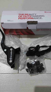 Brembo brake lever set for motorcycles with key attributes: black color ergonomic design branded with Brembo logo includes mounting hardware and packaged in branded box.