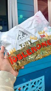 Toblerone Tiny Swiss White Chocolate With Honey & Almond Nougat ( 200g ) BBF.30/03/26