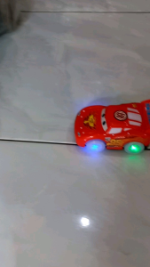 Mainan Mobil Baterai Cars Merah Jalan Bump Go Nyala Lampu & Musik