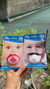 Coral Babies Lips & Mustache pacifier with cover