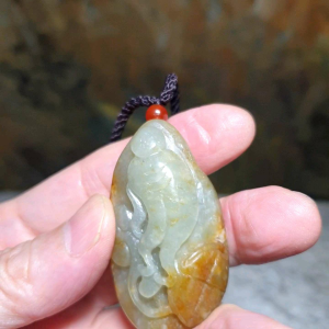Hetian Pebble Nephrite with raw "Jade Skin" light green hand carved Ginseng Ruyi and Coin pendant (with certificate) 和田玉籽玉天然褐黄皮淡青绿手工雕刻人生(参)如意吊坠(带证书)