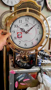 Jam dinding mirado original quartz bandul dan musik perjam+baterai