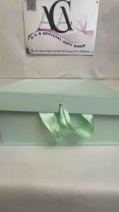 Flip Top Box 10x10x4 inchesMint green gift box with satin ribbon closure.