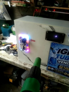 IGIB TUBIG vending machine with coin slot and digital display for water dispensing.