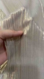 Vải Voan dập ly nhũ kim tuyến màu Kem vàng đồng(khổ1m5)dày mềm co dãn_may đầm váy dạ hộichân váyáo kiểusét thiết kế...thời trang