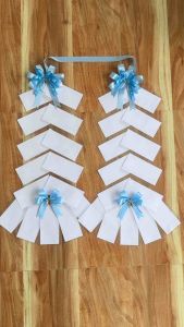 พวงมาลัยวันแม่ใส่ธนบัตร จำนวน 10-12-20-30-40-50 ใบ #ลายอักษร รักแม่ # มีให้เลือกรูปแบบซอง คู่มีปลาย กลม หัวใจ เฉียง ไซค์M (20-50-100) ไซค์ L-XL ใส่ได้ทุกแบงค์