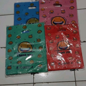 Kantong Plastik Oval Smile Ukuran 30x40 isi 100pcs