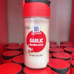 McCormick Garlic Granulated 58g bottle - red cap - white granules - kitchen spice