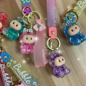 (Màu ngẫu nhiên) Móc khoá Labubububu nước trong suốt_Charm nước móc khoá dễ thương_Móc khoá trang trí treo túi xách chìa khoá…