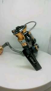 รอกตกปลา อุปกรณ์​ตกปลา​ รอกสปินนิ่ง  G- MAX​ ALL  NEW  WOLF  II  800​/1000/2000/3000/4000 SW