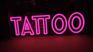 ป้ายไฟ ป้ายไฟร้าน ป้ายไฟตัวอักษร ป้ายไฟวิ่ง ป้ายไฟled ป้ายไฟTATTOO สีชมพู 60x20cm