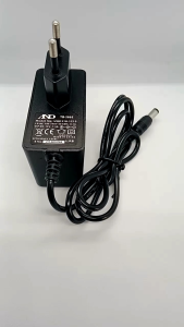 Adaptor TB-286E Model: UUE 318-1215 DC 12V 1.5A