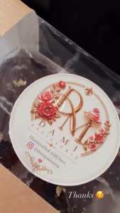 Fudge chocolate brownie with gold leaf decoration and nutella drizzle 5x5x2cm square cube Almond