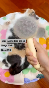 sisir pembersih bulu peliharaan kucing atau anjing