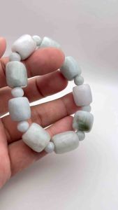 ข้อมือหยกถัง สีขาวอมเขียว ขนาด 14 มิล จำนวน 9 เม็ด หยกพม่าแท้