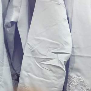 Kebaya Kutu Baru Putih Encim: Pilihan Tepat Untuk Sekolah, Acara Formal & Guru