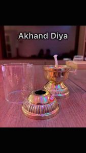 Brass Diya with Glass Cover for Religious Rituals Brass Akhand Jyoti Diya with Glass Chimney (Windproof Brass Oil Lamp) for Ganpati and Navratri festival 90ml ghee approx