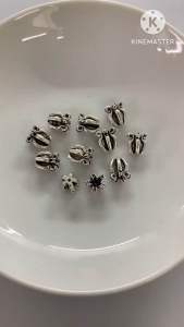 ลูกปัดเงินแท้ เม็ดเงินแท้ ลายดอกรักรมดำ ขนาด 8.9x7.4 มิล รูประมาณ 1 มิล ราคาเม็ดละ 200 บาท