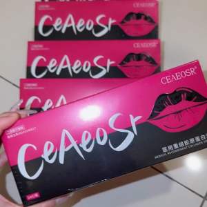 Lips Booster Hydrating Lip Serum 1ml Syringe with Red Handle for Fuller Lips in Pink Packaging