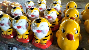 กระปุกออมสินเสือน่ารักราคาถูก