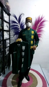 Baju koko bordir motif pintu Aceh