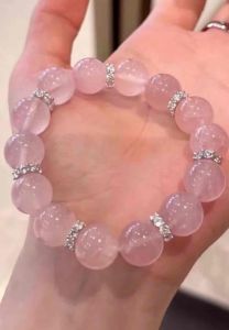 “Madagascar Rose Quartz Bracelet | Love & Harmony | Attract LovePowerful Energy Good Luck Health CrystalHappinessFashion BraceletPerfect for Gifts or personal usElegant Gift for Charm 天然马粉水晶手链 | 爱与和谐的象征 | 精致设计,送礼首选,提升气场魅力”