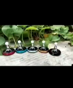 parfum pajangan dashboard mobil motif singa laut bola putar tenaga surya