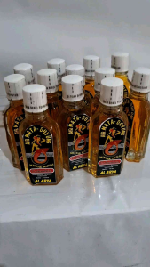 6 botol minyak wangi cap airmata duyung warna kuning
