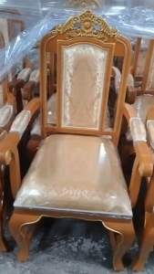 เก้าอี้แบบมีพนักแขนไม้สัก