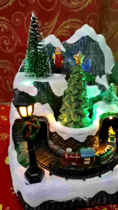 CHRISTMAS VILLE WITH ROTATING SANTA CLAUSTRAIN AND TREE DIAPLAY