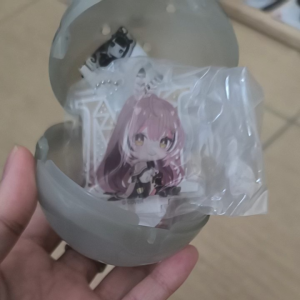 Genuine and brand new acrylic keychain featuring Nanashi Mumei a virtual YouTuber from Hololive English.