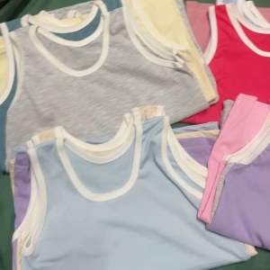 KidST-02 เสื้อกล้ามเด็ก วัย 2-4 ขวบ สีพื้นอ่อน เสื้อเด็กราคาถูก สีเข้ม พร้อมส่ง