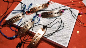 name stamp on copper bracelet with strings and beads on 0.2mm copper sheet. maximum 8 letters