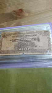 100% Authentic Collectables Malaya (Japanese Occupation) 100 Dollars "Banana Money" Japanese Government Note *Actual photo taken not from library *Catalogue #ssn 0124 *Note heavily torn only for professional and collector willing to restore