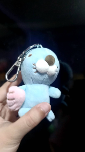 Bono Bono Charm Plushie Blue plush otter keychain with pink paw and silver clip (Preloved)