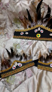 Mahkota Pesta Adat Dayak: Simbol Kekuasaan dan Tradisi