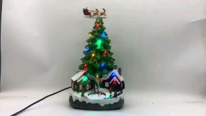 SANTAS SLEIGH ABOVE THE CHRISTMAS TREE VILLAGE DISPLAY