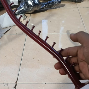 sulingan paku 12 belalay tembok merah marun