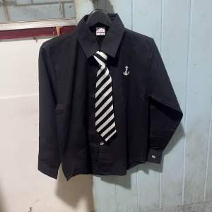 เสื้อเชิ้ตเด็กแขนยาวสีดำ(1-15ปี) เล็กถึงเด็ก