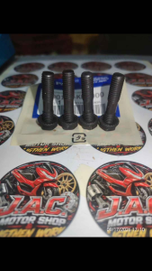 Black bolts with hexagonal heads on JAC Motor Shop stickers. Four bolts black finish hexagonal heads threaded shafts on branded stickers.