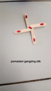 Mainan gangsing pemadam dari stik