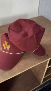 Topi sekolah SD merah polos BORDIR