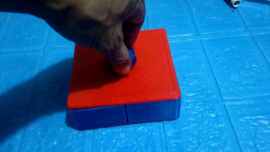 3D Printed Jewelry Rotation Box with Red Rose and Blue Hexagon Top for Elegant Storage