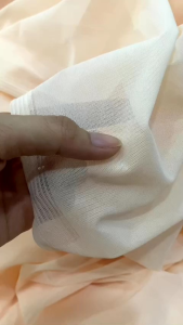 vải thun lưới dai màu cam sữa co dãn 4 chiều dày vừa mềm mịn rũ _( khổ 1m6)may đầm váy áo thiết kế phối kiểu vv