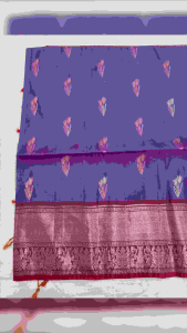 KANCHIPURAM SOFT silk saree with copper JARI Purple silk saree with intricate silver patterns and red tassels.