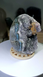 Amethyst Geode Crystal Specimen with Quartz and Calcite Inclusions on Wood Stand