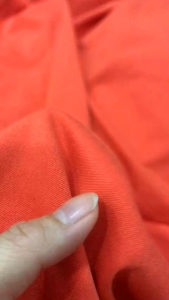 vải cotton lụa hàn quốc màu cam dày vừa _( khổ 1m5) co dãn nhẹ may đầm váy vest quần tây